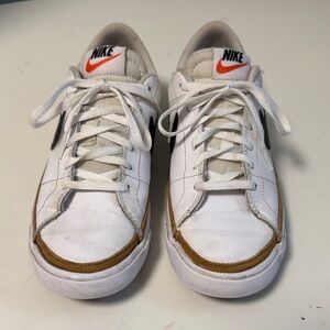 Nike White Leather Sneakers with Black Swoosh